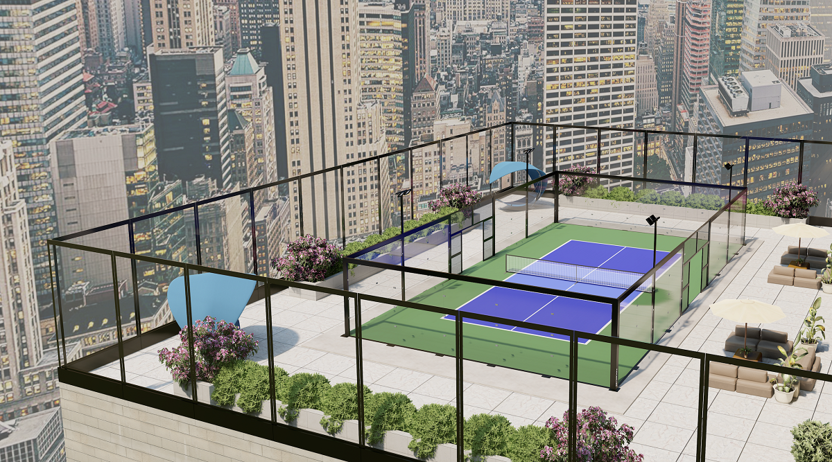 Pickelball court on city apartment roof with glass fencing