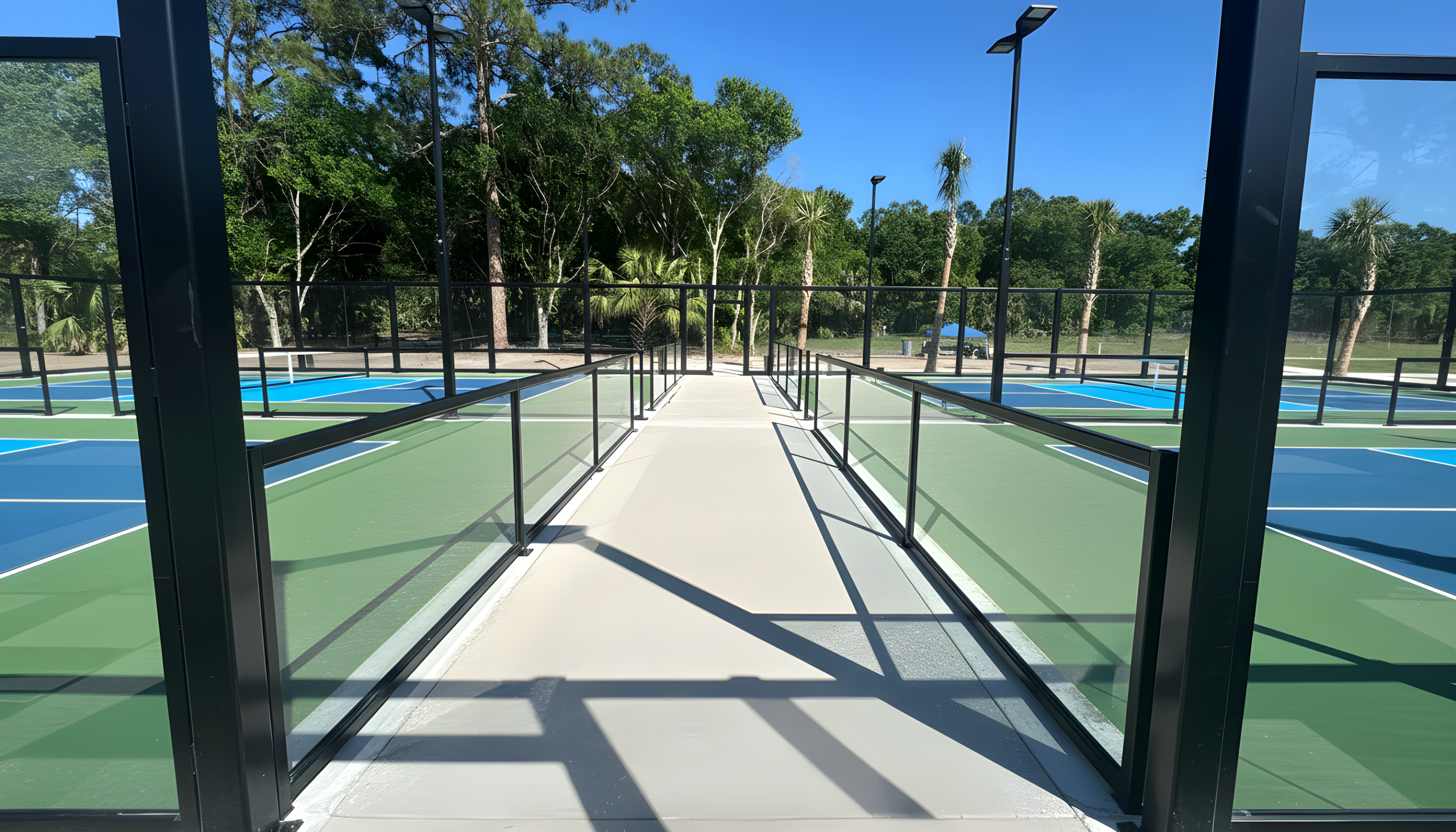 PICKLEGLASS™ acoustic enclosure system installed at PICKLEGLASS enclosure Country Estate, Stuart FL
